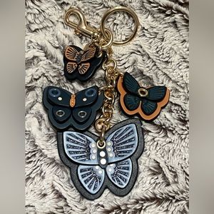 Coach bag charm in denim and leather